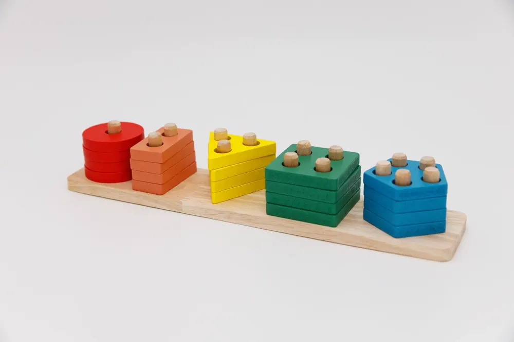Colorful Montessori-inspired wooden stacking and sorting materials